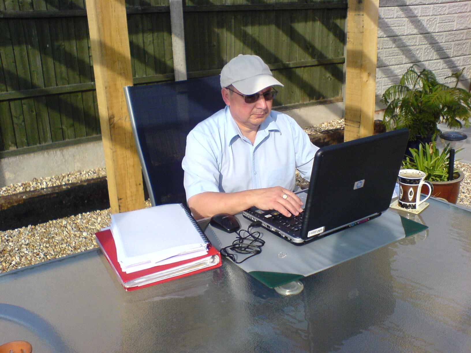 03-09-05 Jim on Laptop in garden